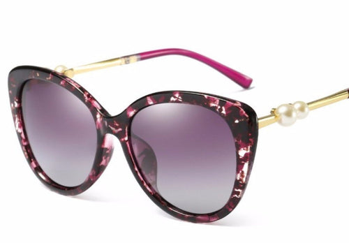Lunettes de soleil femme monture marbrée rouge et perle, verres violets dégradés