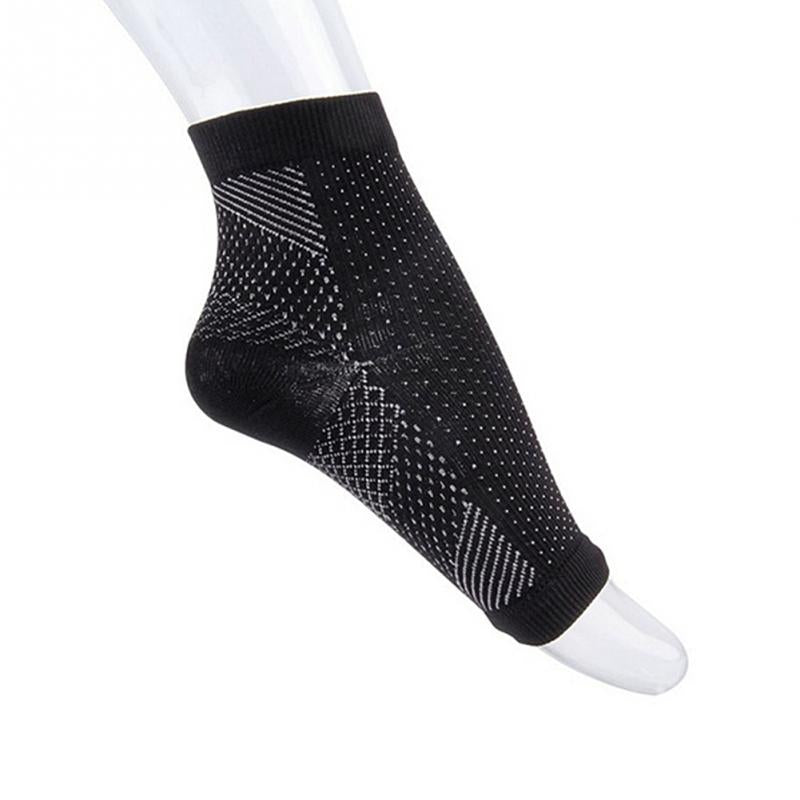 Chaussette de compression anti-fatigue noire, motif maillé et tissage perforé.