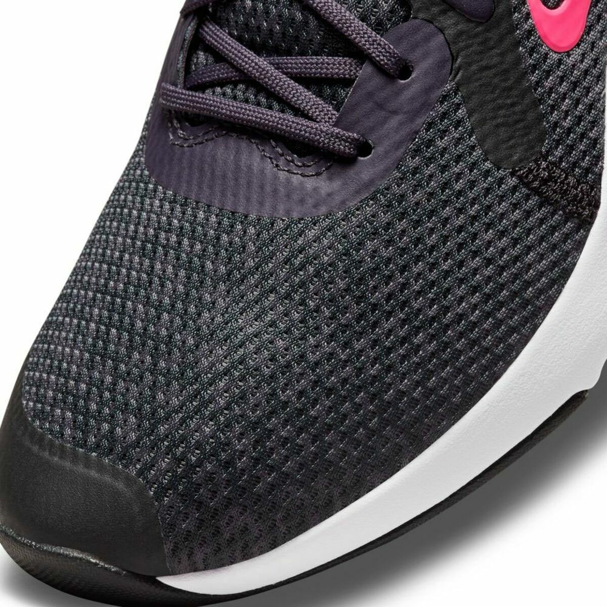 Empeigne de chaussure noire Nike avec maille texturée, lacets et bordure blanche