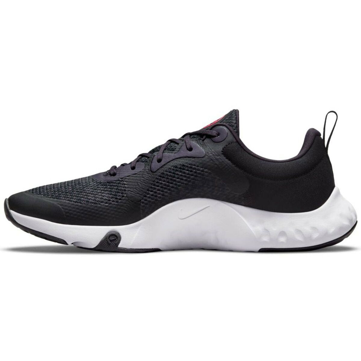 Chaussure de running Nike TR 11 adulte noire, semelle blanche et amorti sous le talon.