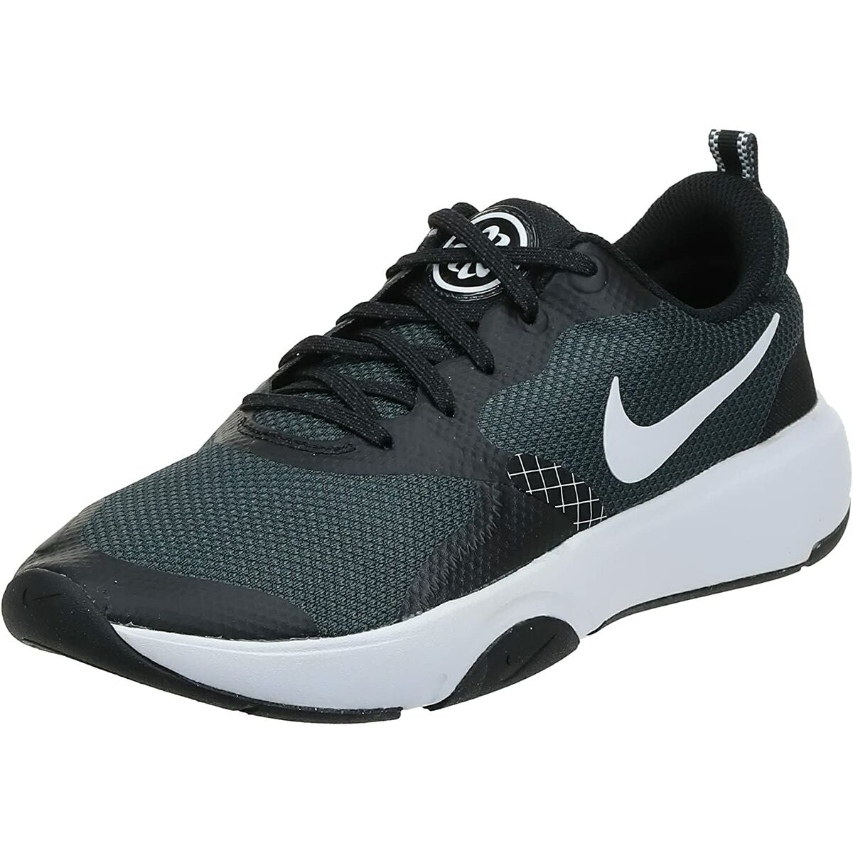 Chaussure Nike vue trois quarts, dessus vert foncé, semelle blanche, logo Swoosh