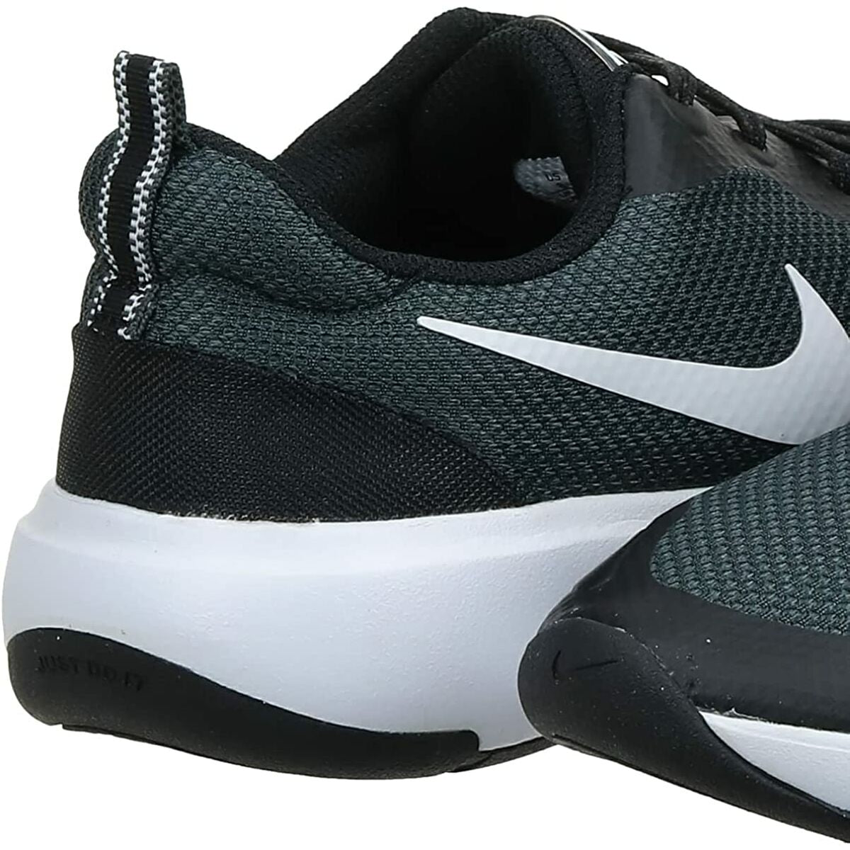 Chaussure Nike vert foncé, logo Swoosh blanc, lacets noirs, semelle blanche