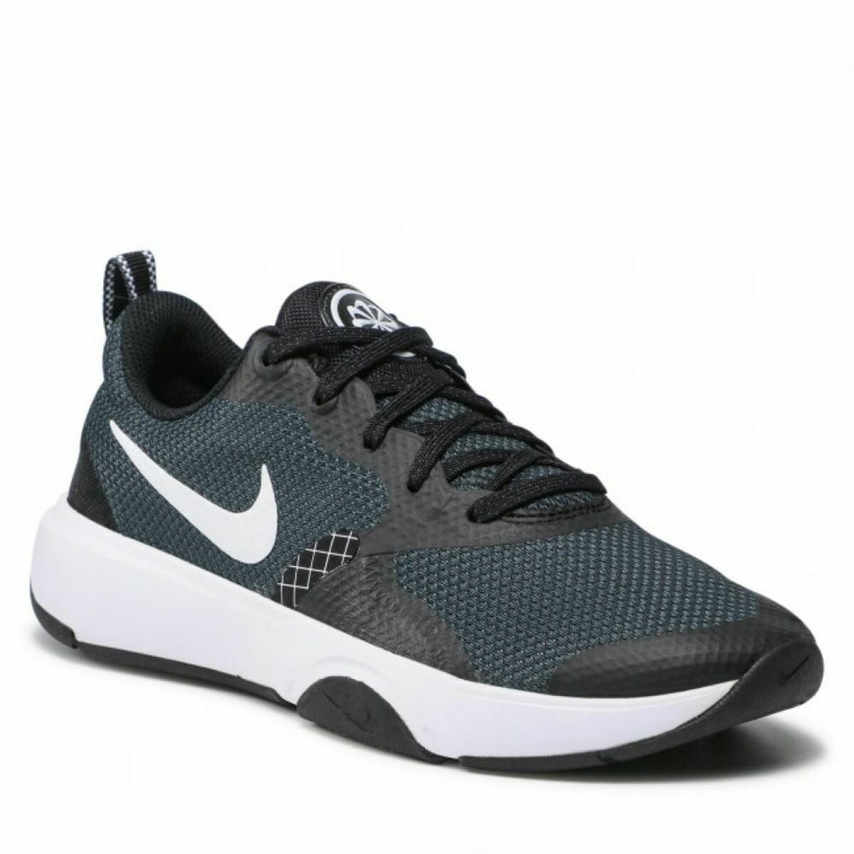 Baskets Nike pour femme en tissu vert foncé, lacets noirs, semelle blanche épaisse