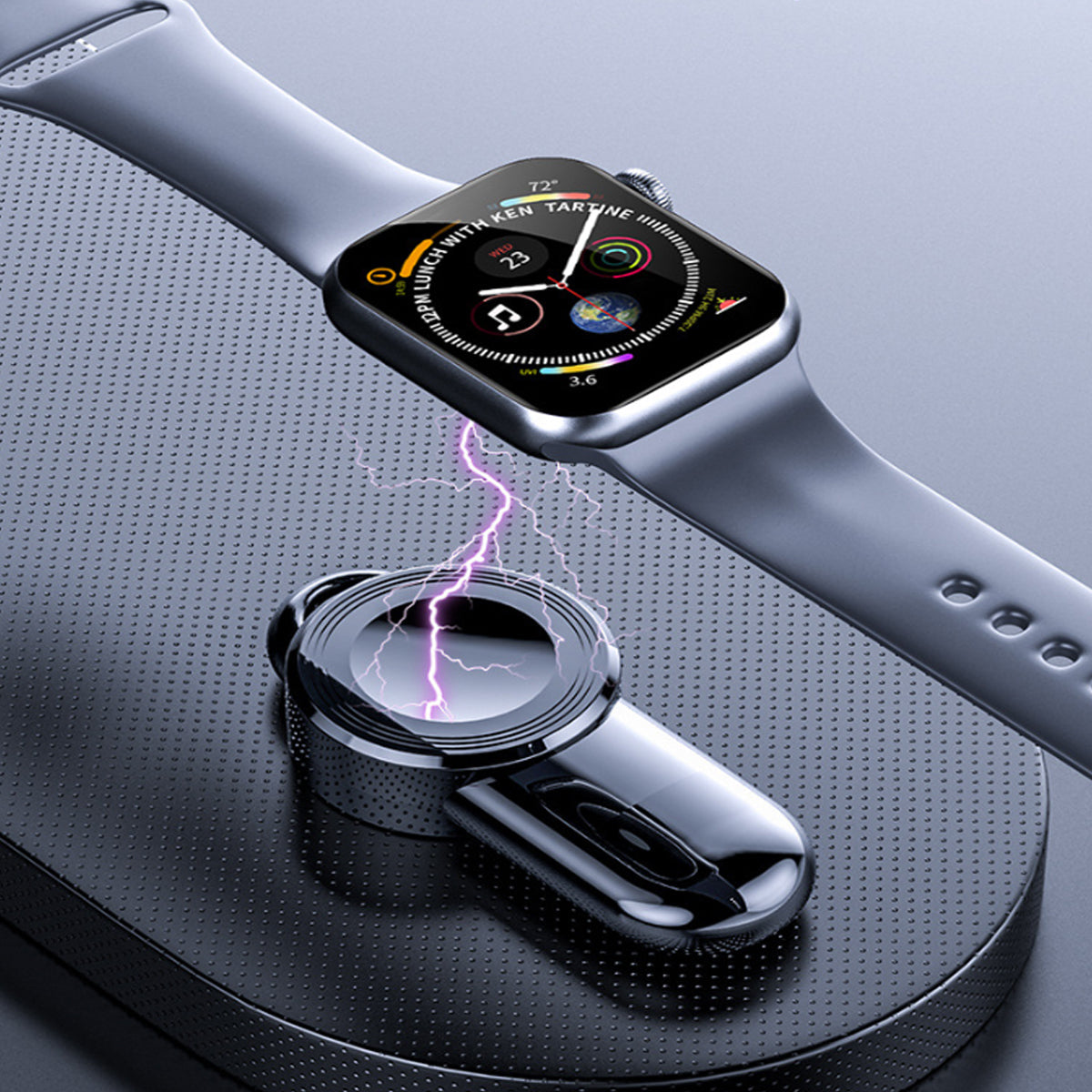 Chargeur USB noir posant une Apple Watch sur un socle, avec effet lumineux