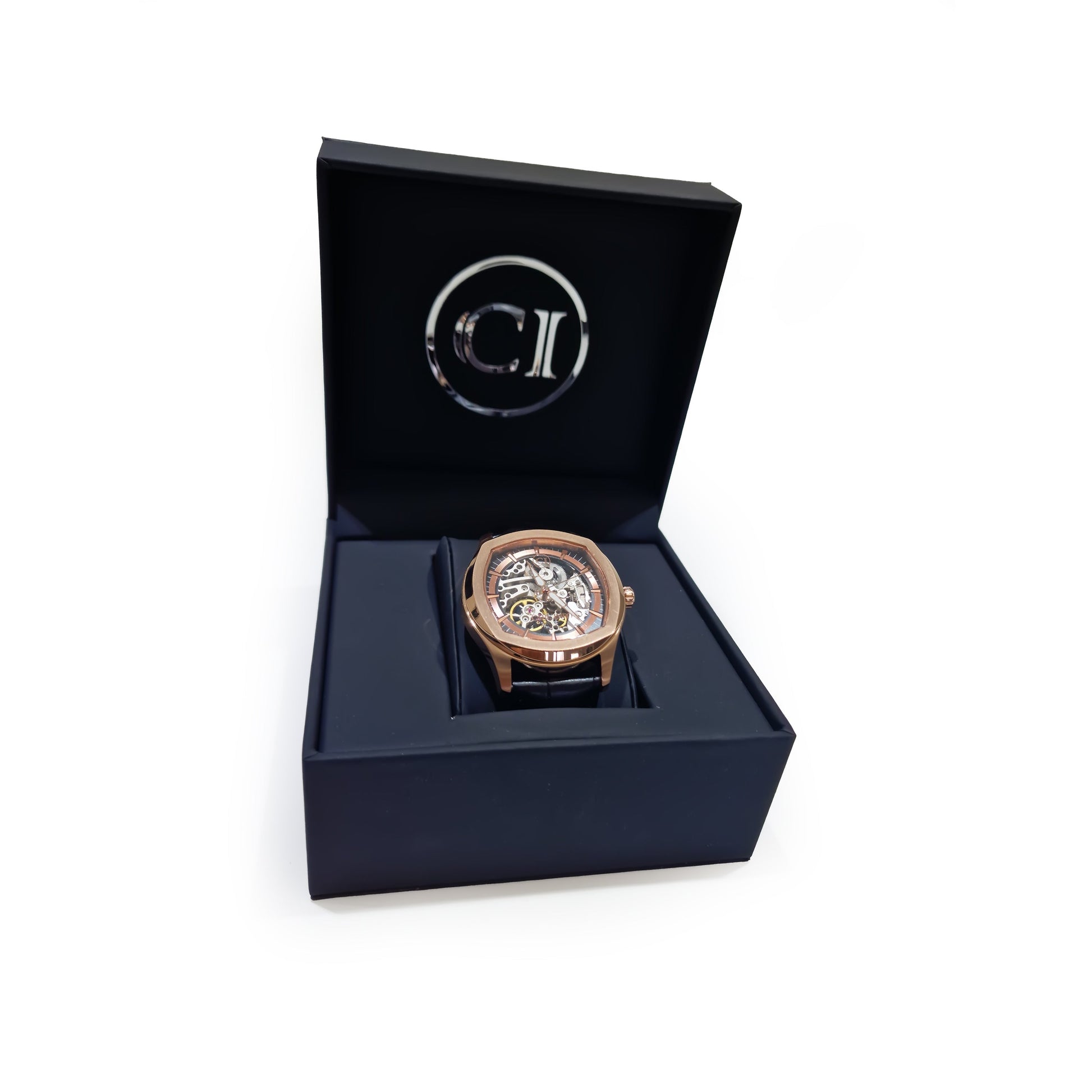 Montre squelette homme en boîte cadeau, boîtier rosé et bracelet cuir noir