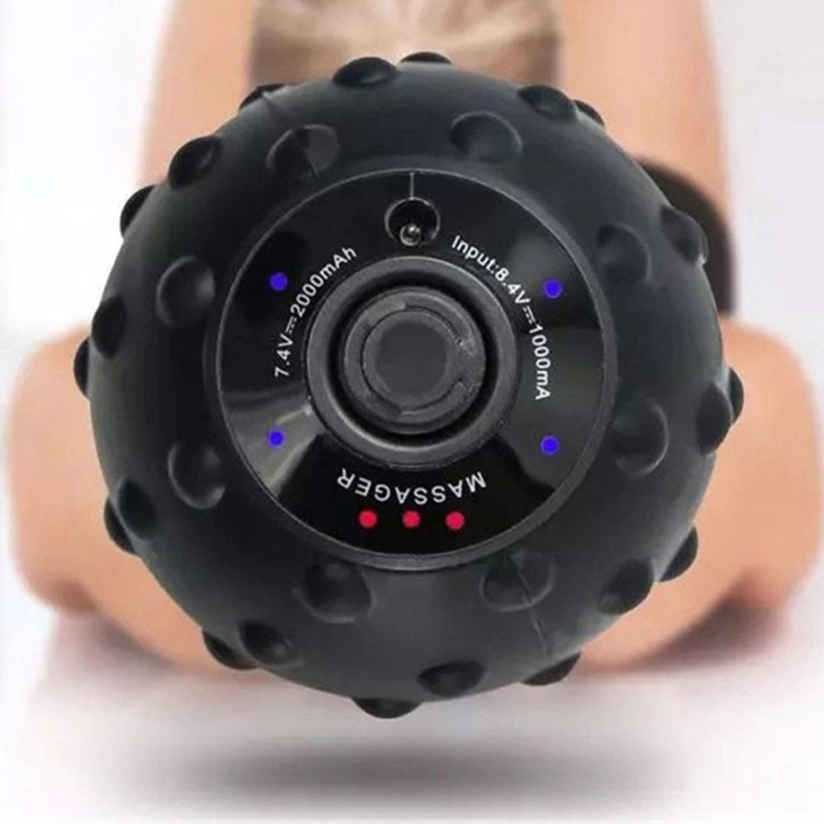 Boule de massage vibrante noire, face de contrôle avec boutons et voyants bleus/rouges.