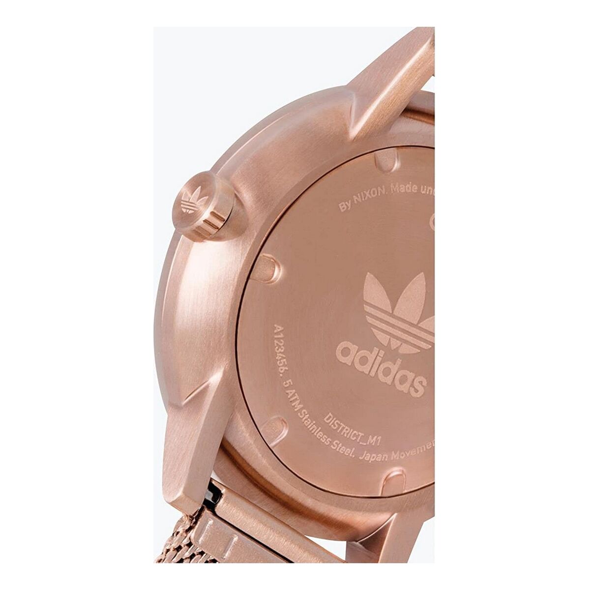 Montre Adidas rose doré, fond de boîtier avec inscriptions et logo