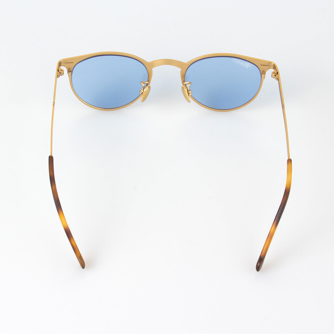 Lunettes de soleil unisexes, monture dorée et verres bleus ovales