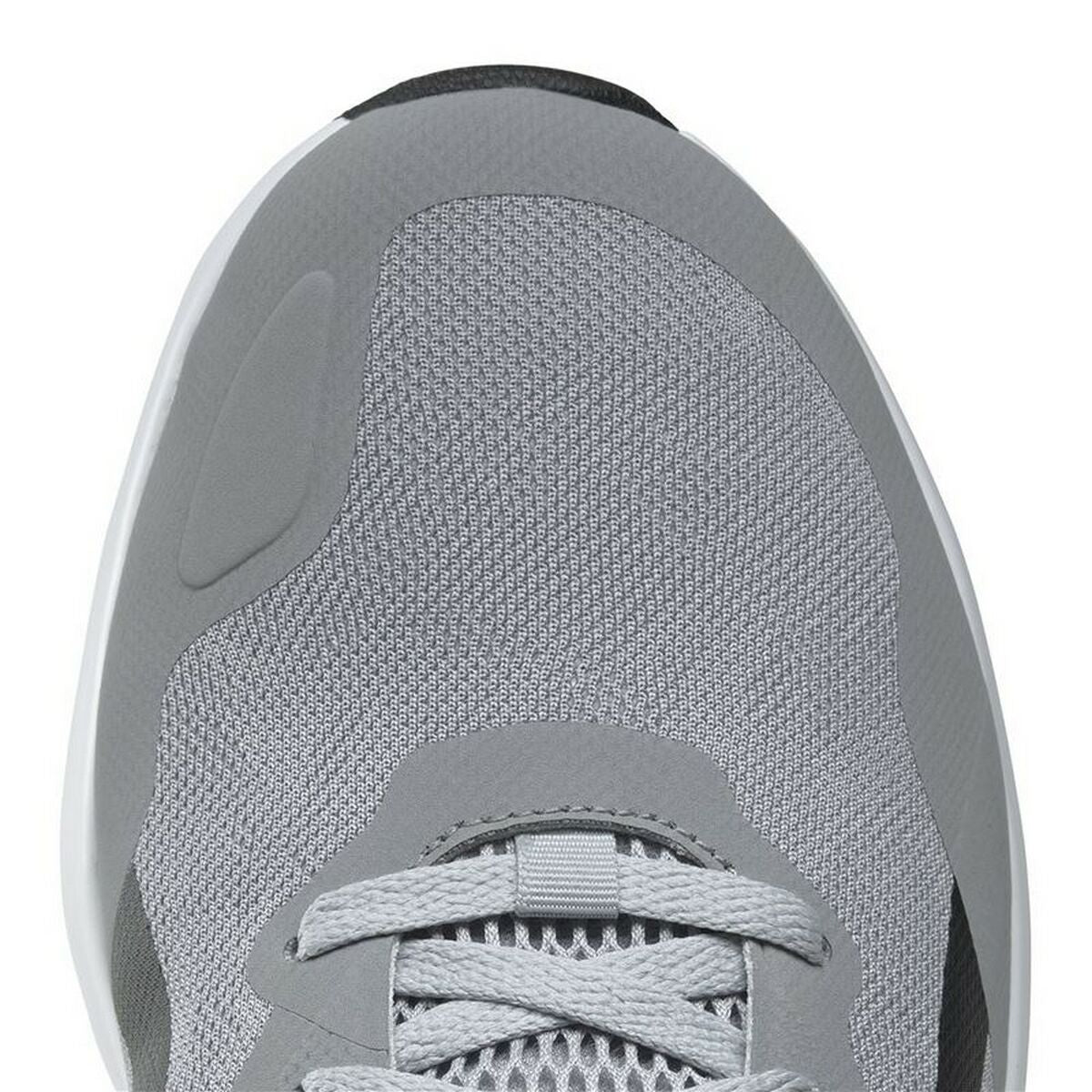Haut de chaussure de running grise en mesh, détails de couture et lacets