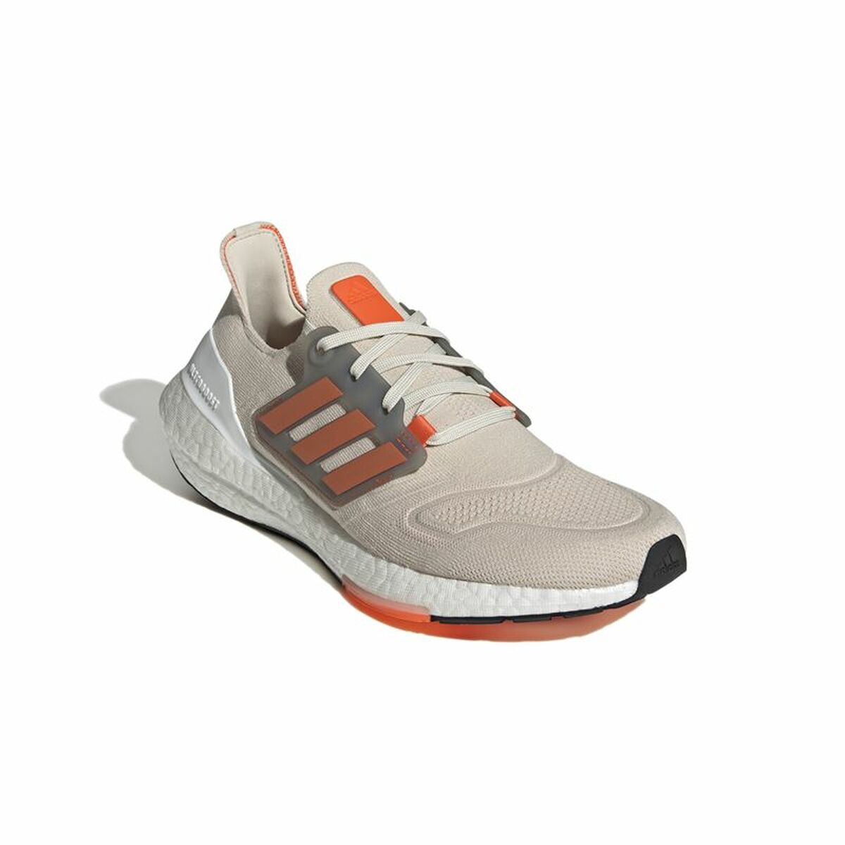 Chaussure de running Adidas Ultraboost 22 beige, logo orange et semelle blanche à bord orange
