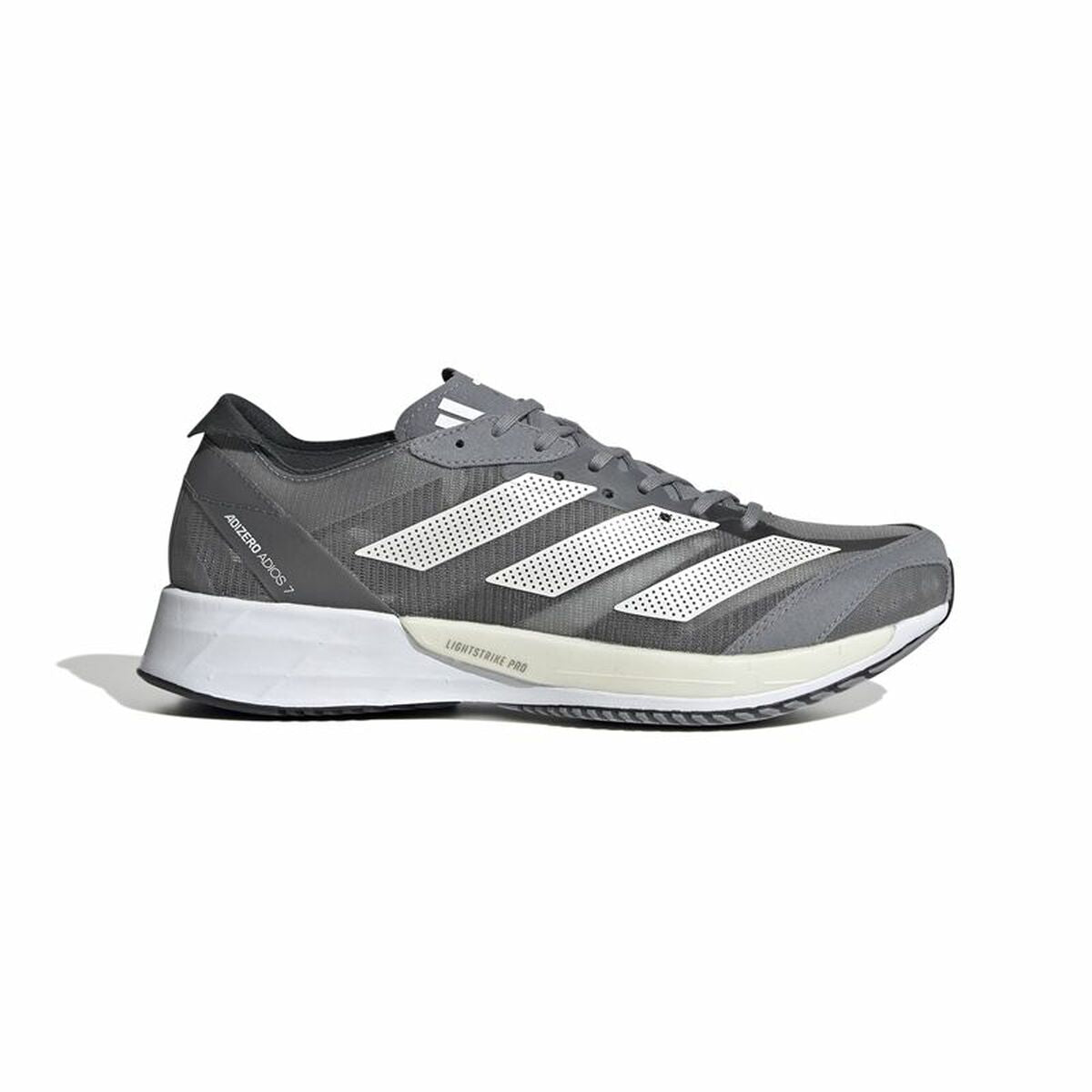 Chaussure de running adidas grise foncée, forme profilée, empiècements blancs et semelle
