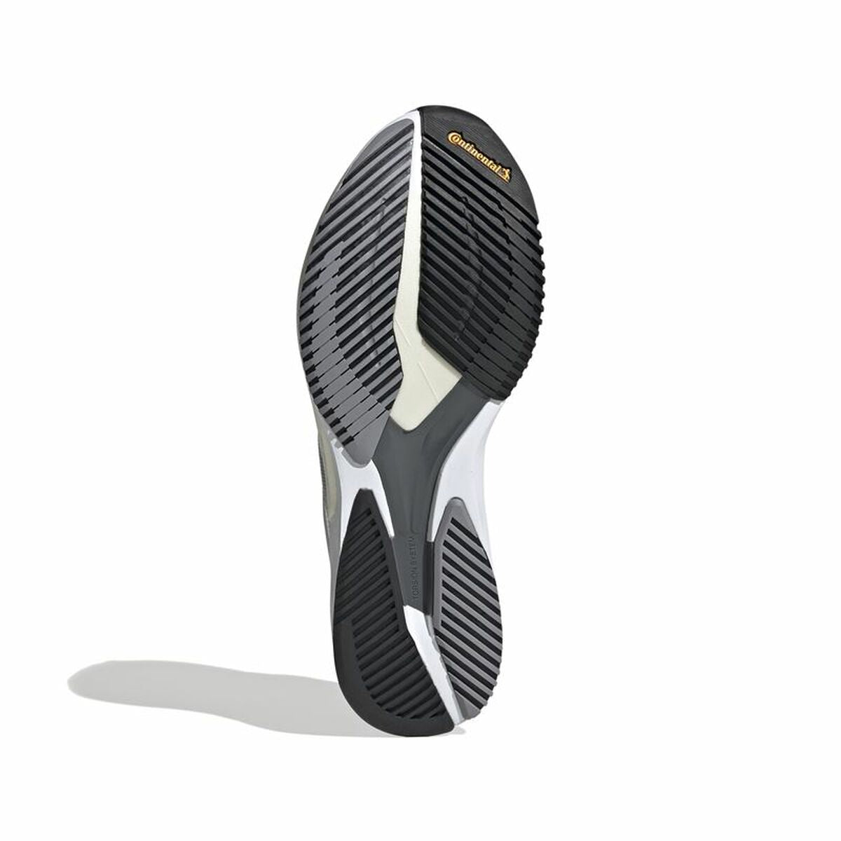 Chaussure de course Adidas, semelle extérieure noire texturée avec zones blanches