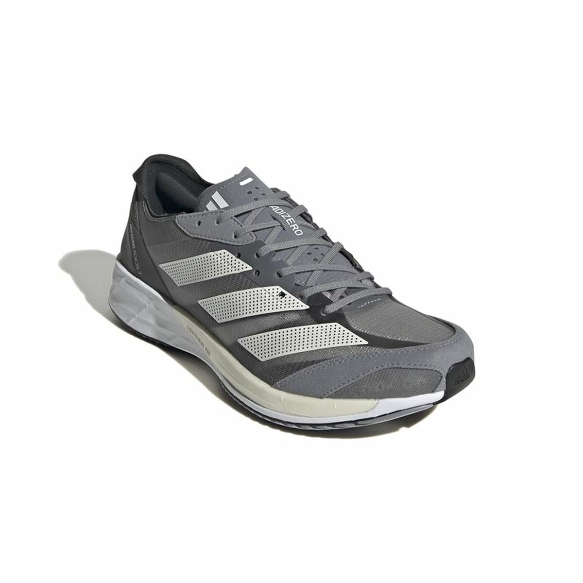 Chaussure de course Adidas gris foncé, vue de profil, semelle avec nervures