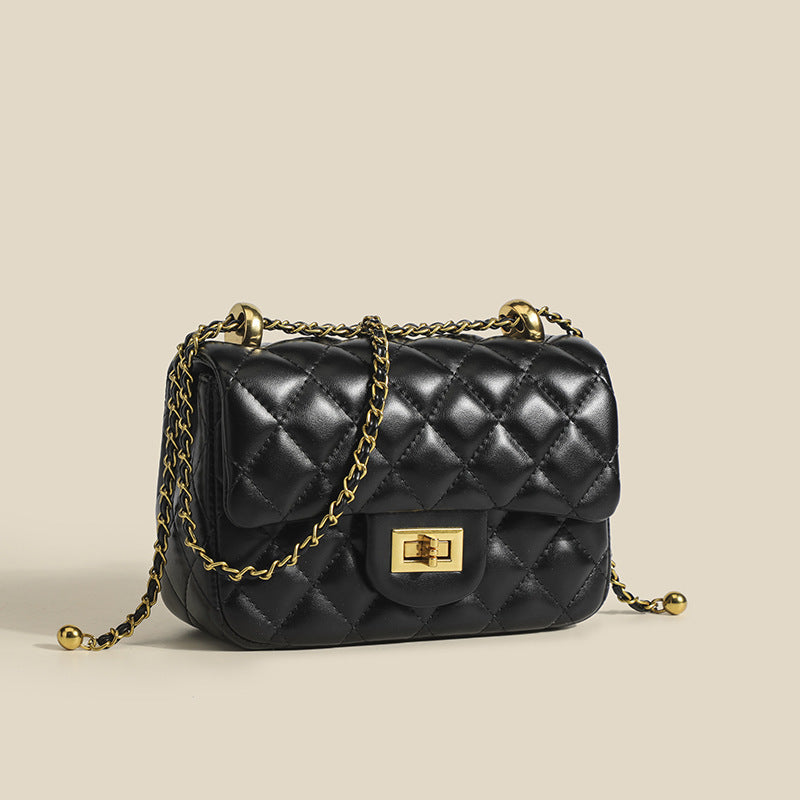 Mini sac bandoulière matelassé noir, rabat à fermoir doré et chaîne