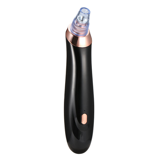 Aspirateur facial noir pour points noirs, embout en métal cuivré et bouton lumineux