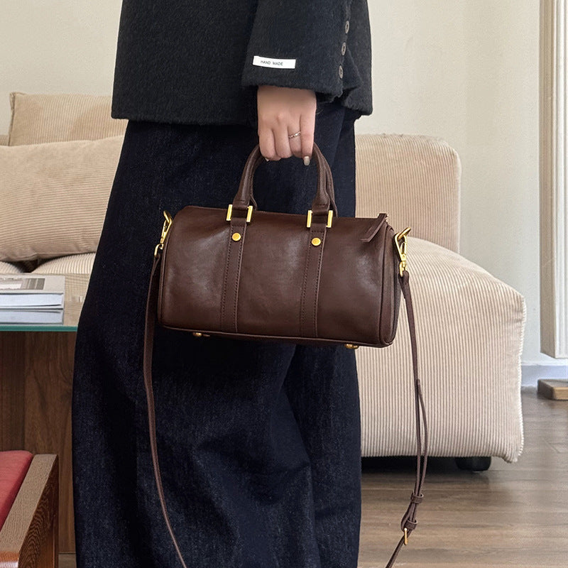 Sac bandoulière en cuir marron avec poignées, bandoulière amovible et fermeture éclair