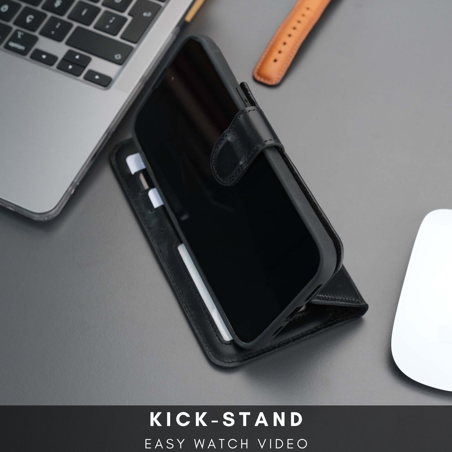 Coque portefeuille en cuir noir avec support dépliable et logement pour téléphone.
