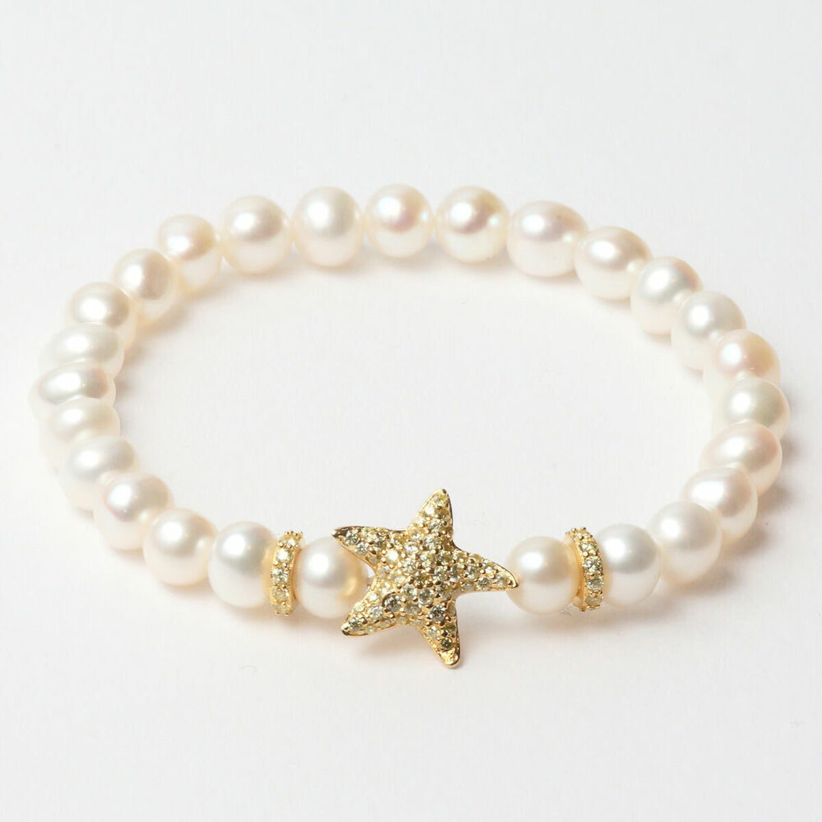 Bracelet en perles nacrées blanches et étoile strass dorée, élément central