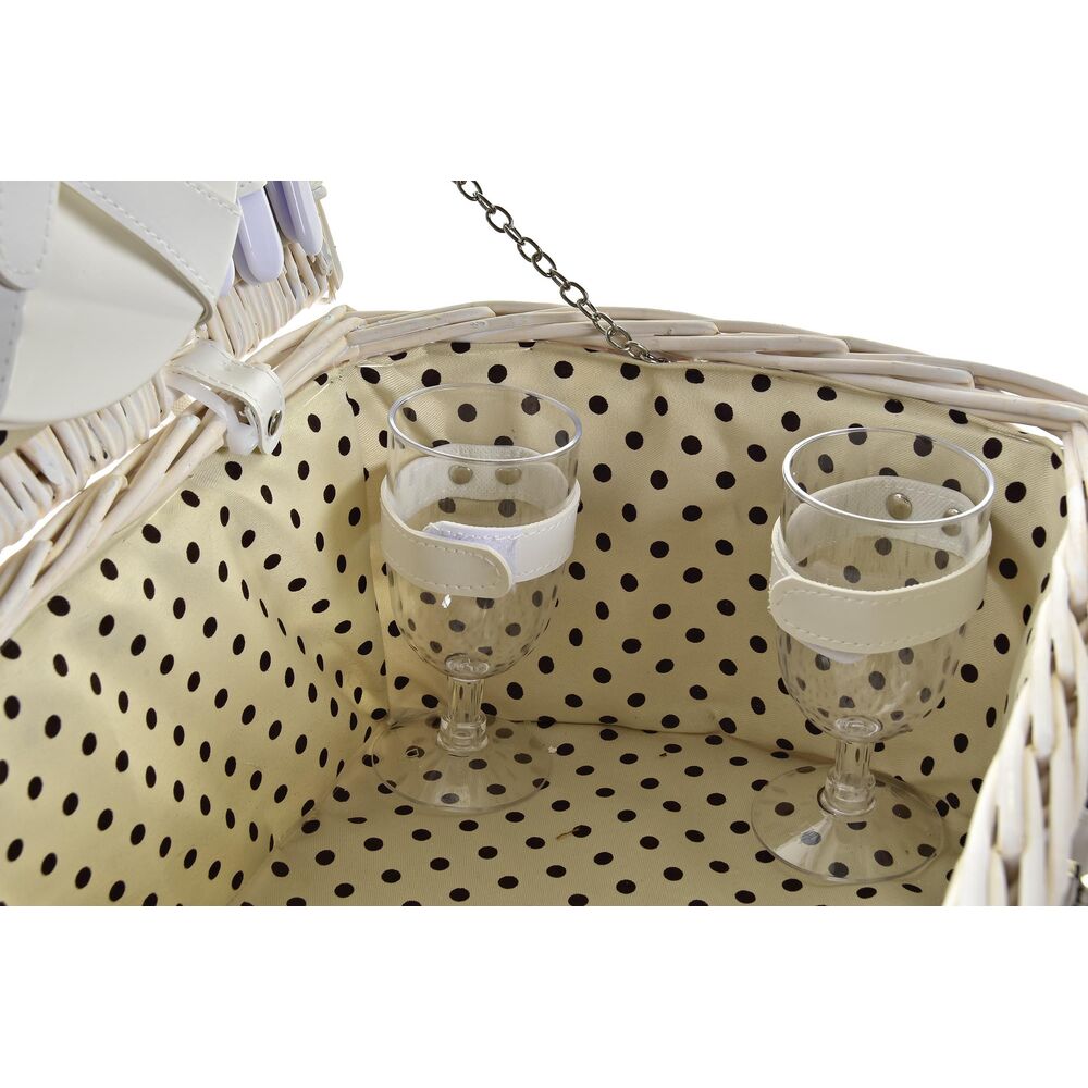 Panier pique-nique en osier, rangements intérieurs à pois et deux verres.