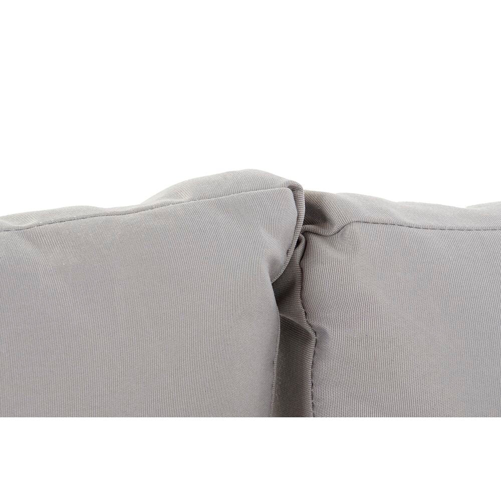Coussin d’angle de salon de jardin gris avec coutures visibles sur accoudoir rembourré.