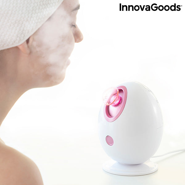 Sauna facial électrique blanc Innovagoods près du visage, ouverture rose