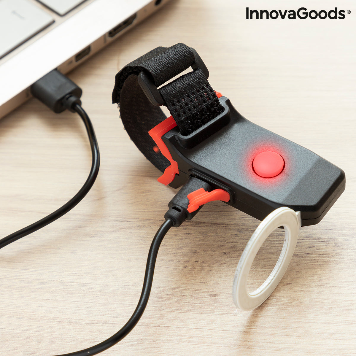 Feu arrière LED de vélo rouge clignotant Innovagoods, voyant rouge sur boîtier noir.