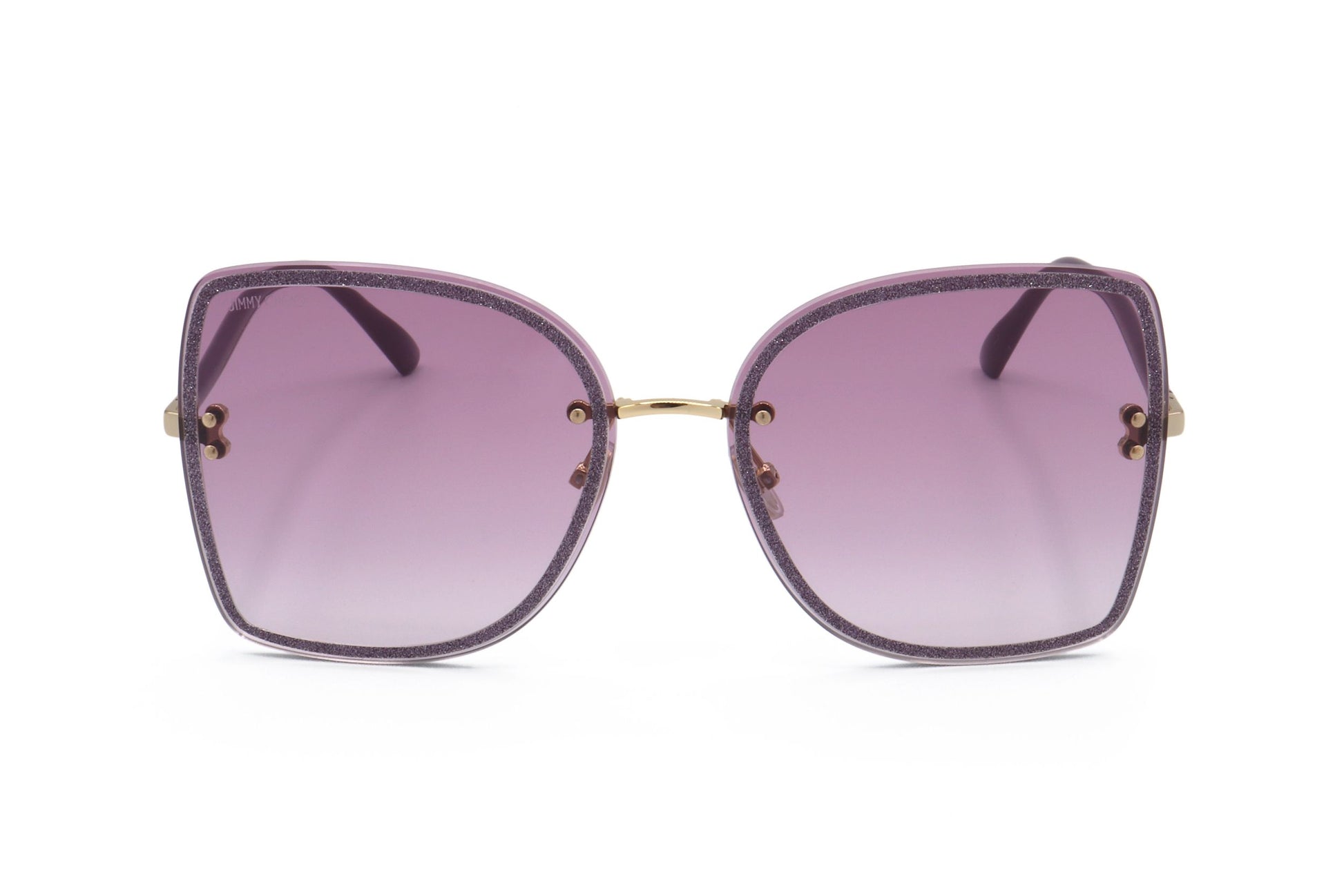 Lunettes de soleil femme à monture métal or prune, verres dégradés violets.