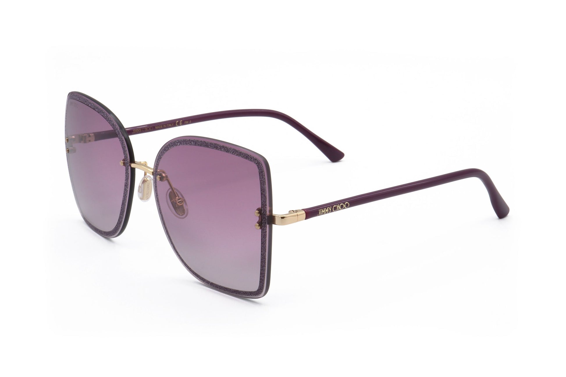 Lunettes de soleil à monture métal or prune, vue trois-quarts, verres dégradés.