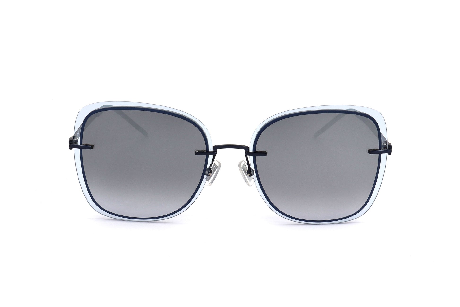 Lunettes de soleil femme monture bleu clair et verres gris, forme carrée arrondie.