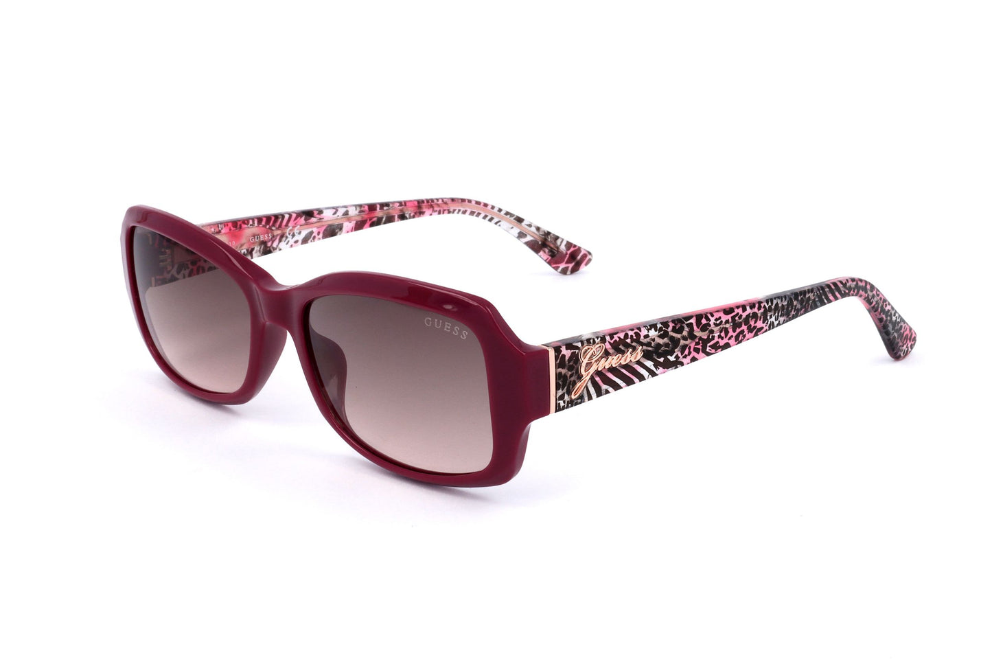 Lunettes de soleil Guess femme, monture rose, branches à motif léopard, verres teintés.