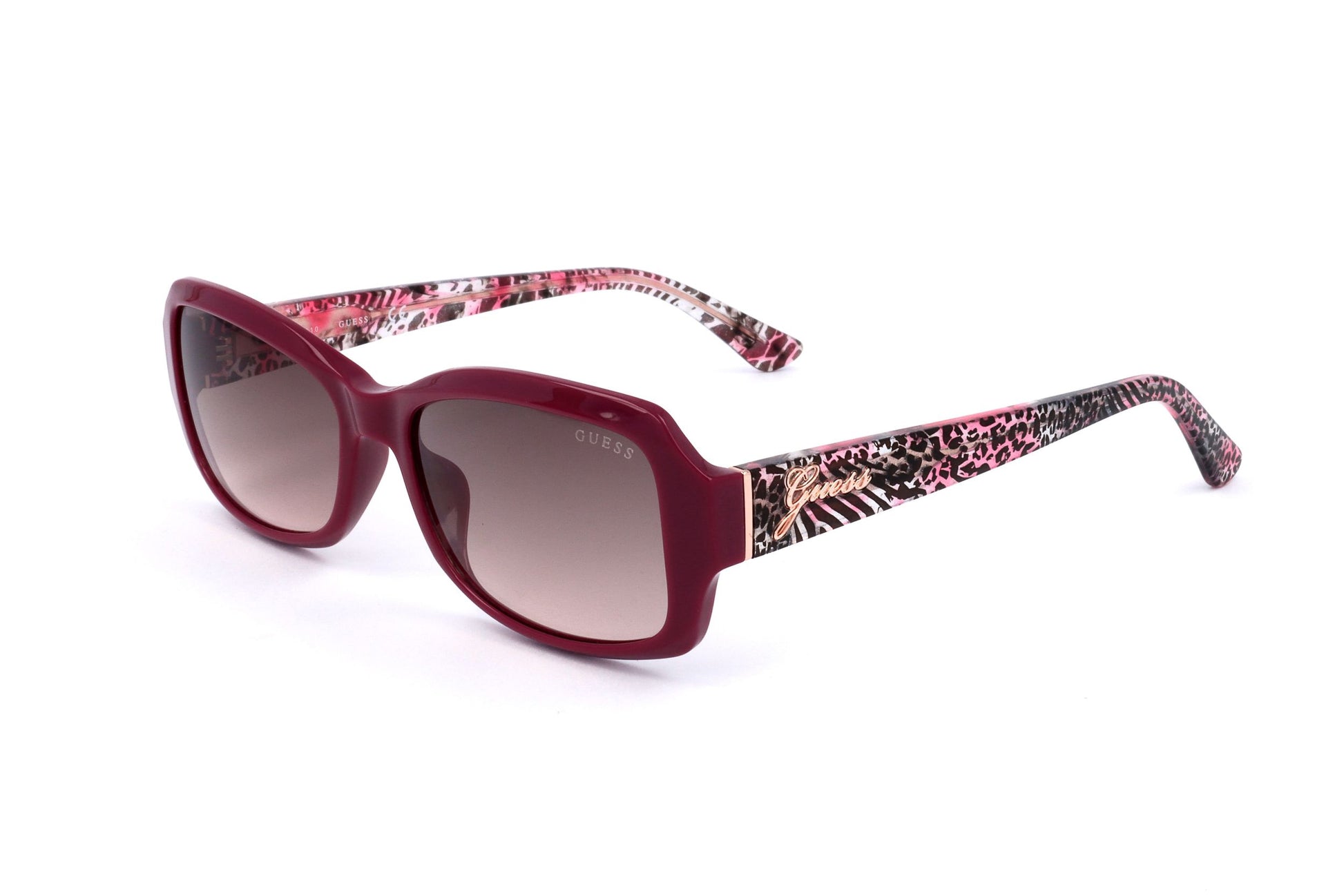 Lunettes de soleil Guess femme, monture rose, branches à motif léopard, verres teintés.
