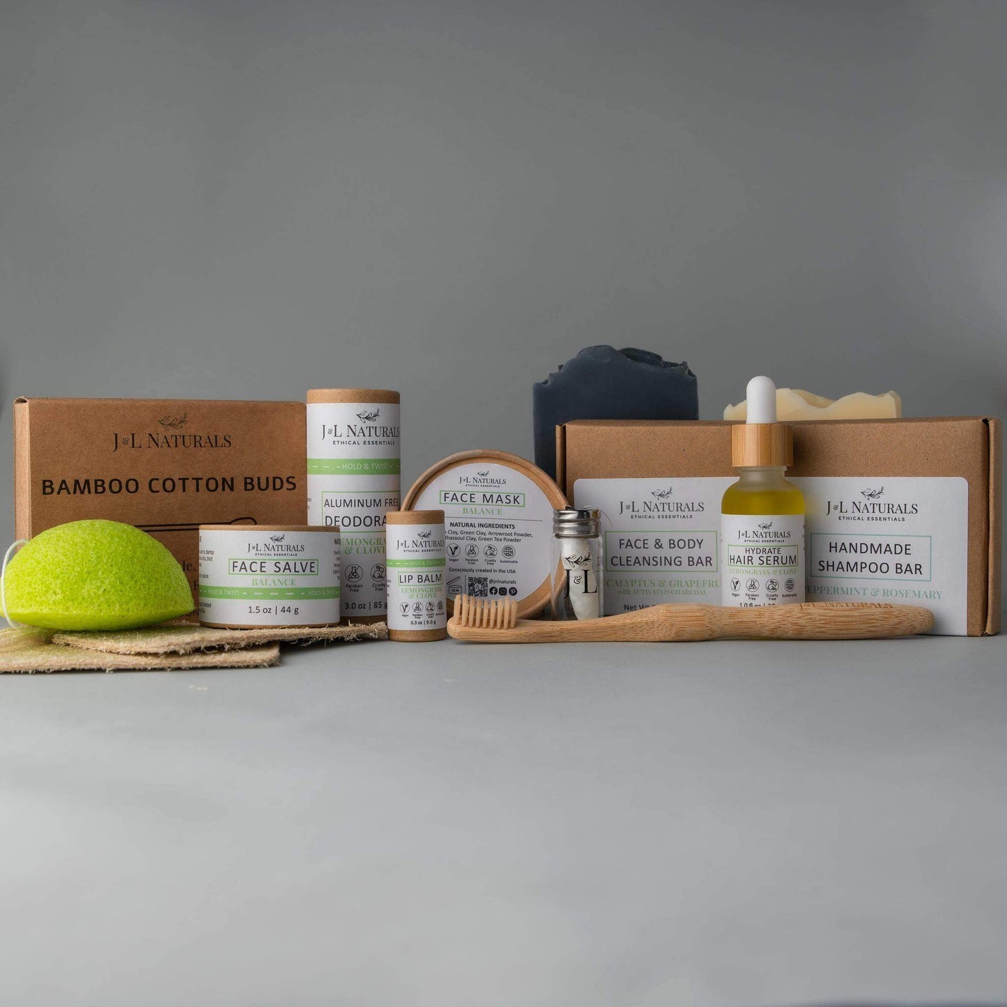Coffret de soins J.L. NATURALS avec barres et flacons, éponge verte et face mask