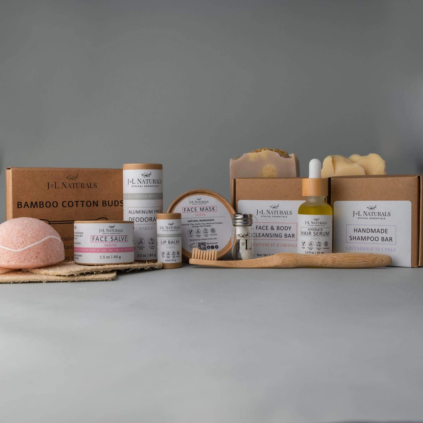 Coffret de soins J.L. NATURALS avec éponge rose, face mask, baume lèvres et shampoo bar