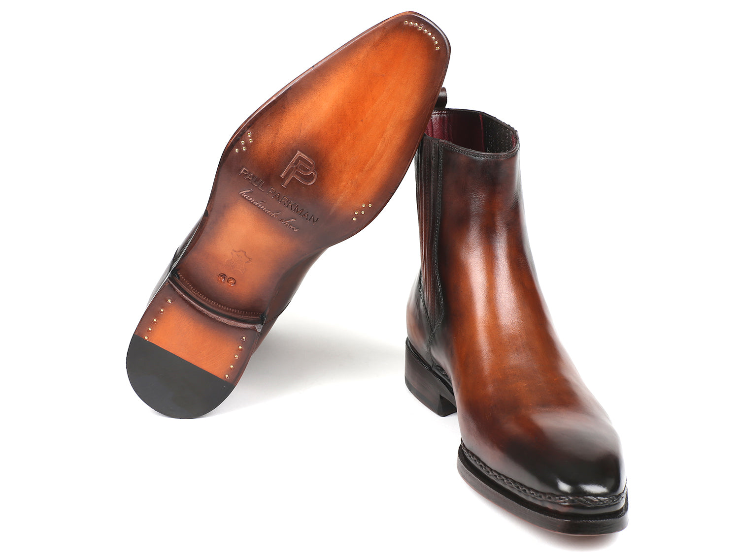 Bottes Chelsea en cuir brun patiné, vue semelle intérieure et talon, semelle noire