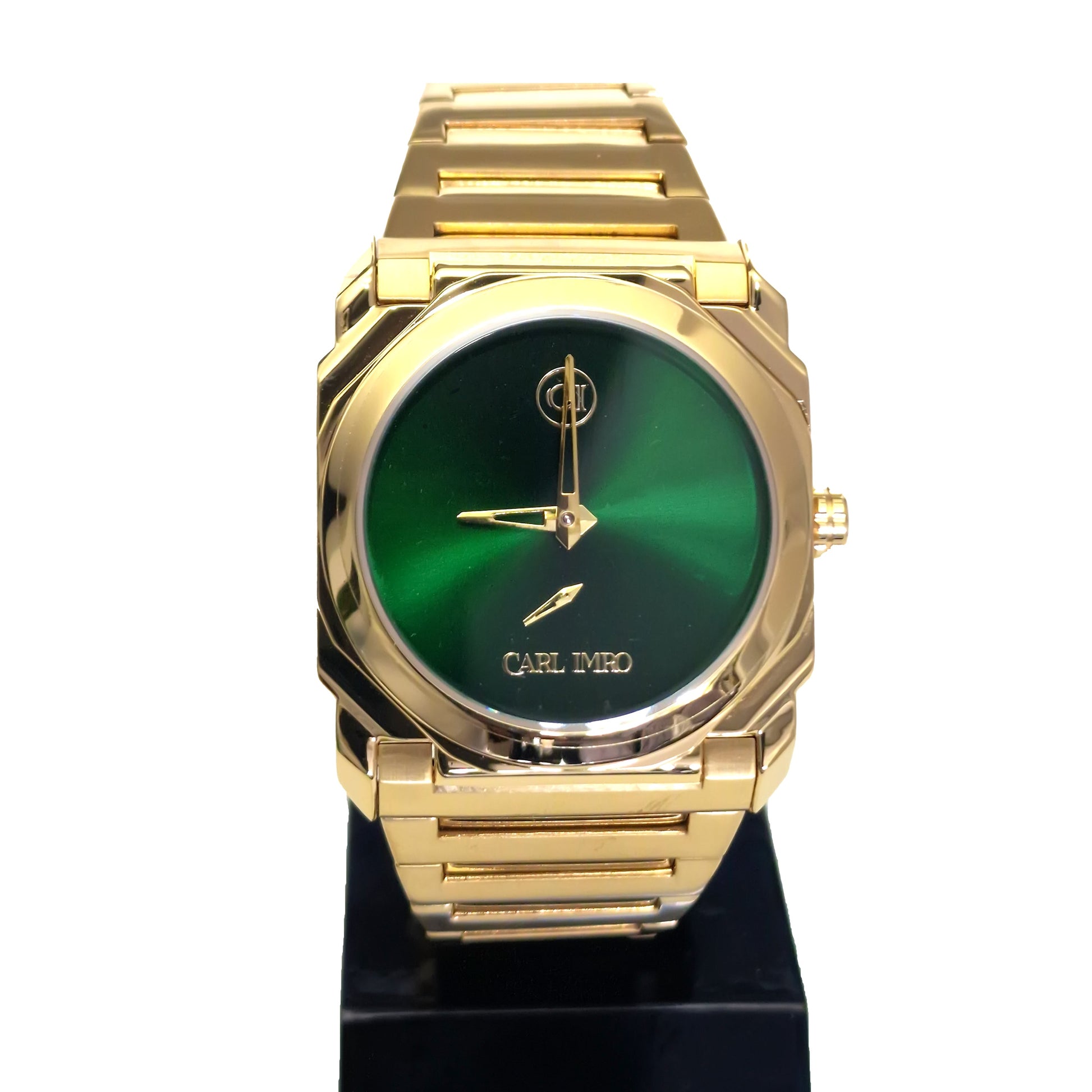 Montre-bracelet en acier doré 40 mm, cadran vert et bracelet à maillons.