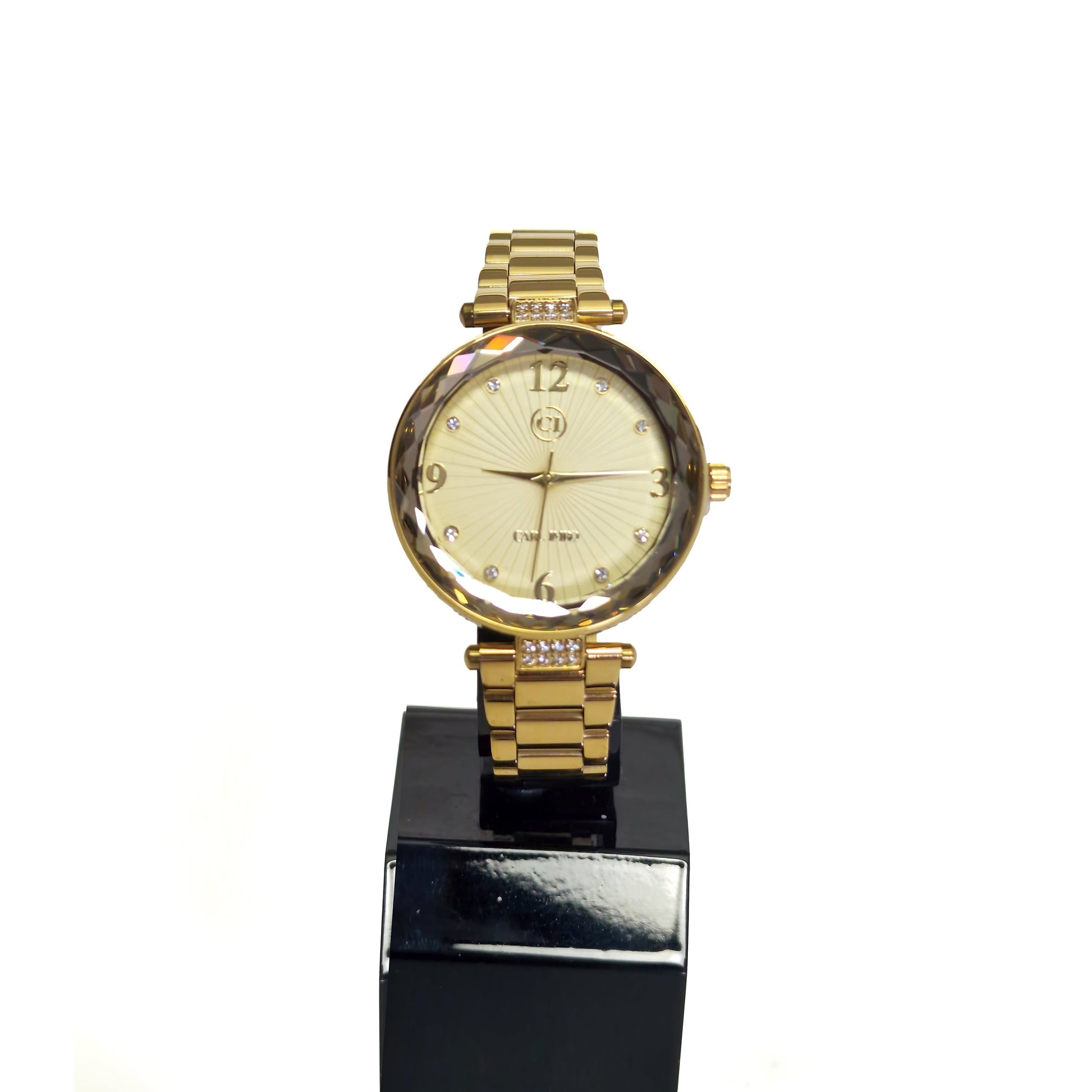 Montre femme plaquée or, cadran ivoire, bracelet maillons, lunette facettée sertie