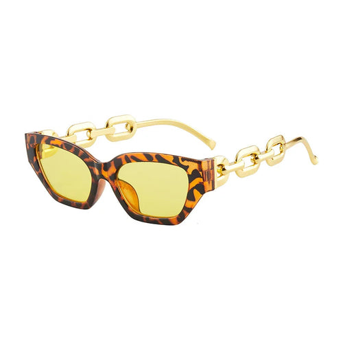 Lunettes de soleil œil-de-chat écaille avec verres miroir jaunes et chaîne dorée