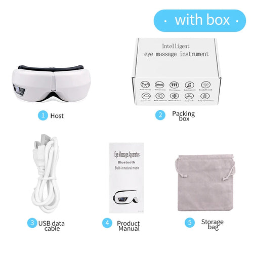 Massageur des yeux blanc avec boîte et accessoires : câble, manuel, sac de rangement
