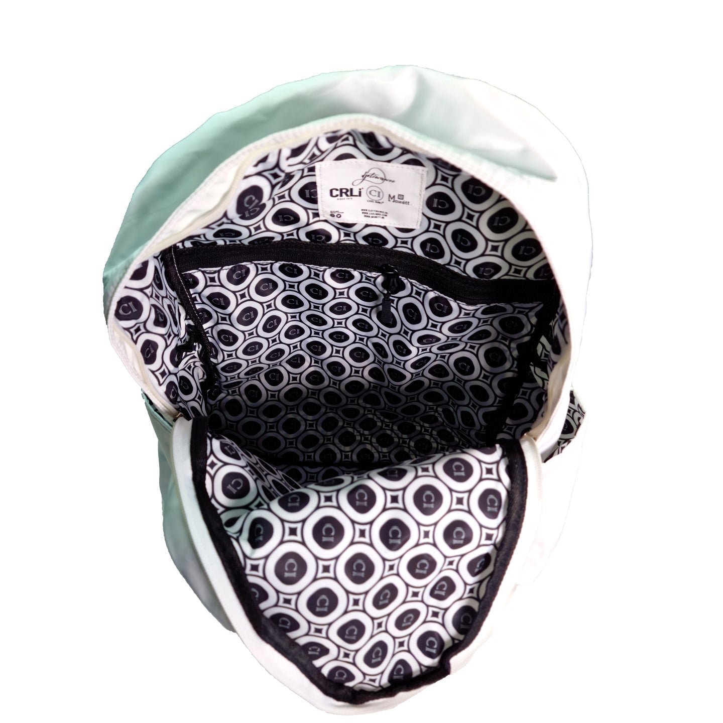 Sac à dos blanc ouvert, intérieur doublé à motifs noirs et blancs