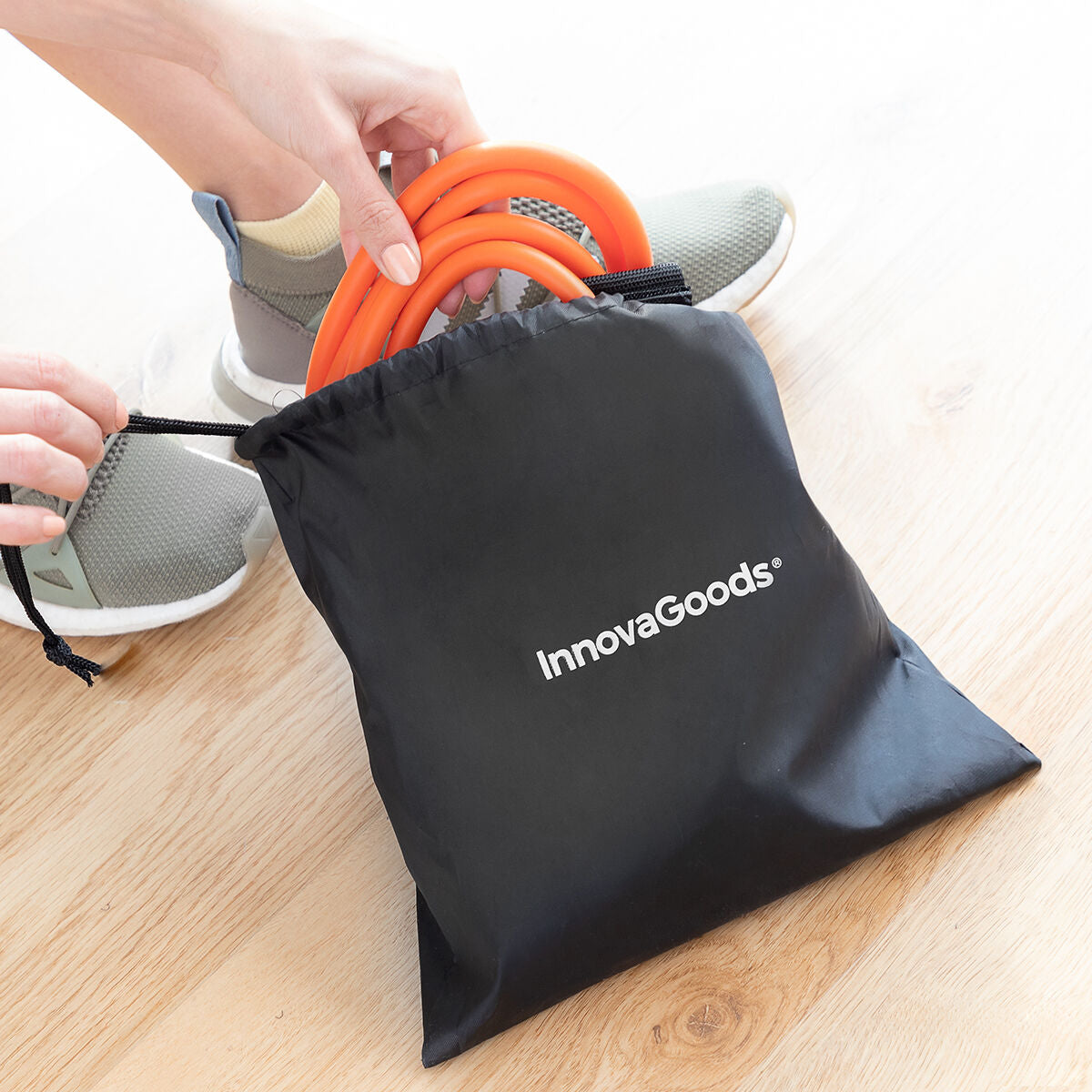 Ceinture de renforcement fessiers avec sac de rangement noir Innovagoods et élastiques orange