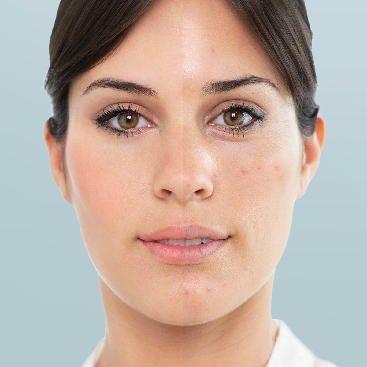 Visage de femme, peau lisse et éclatante, cheveux bruns, regard direct