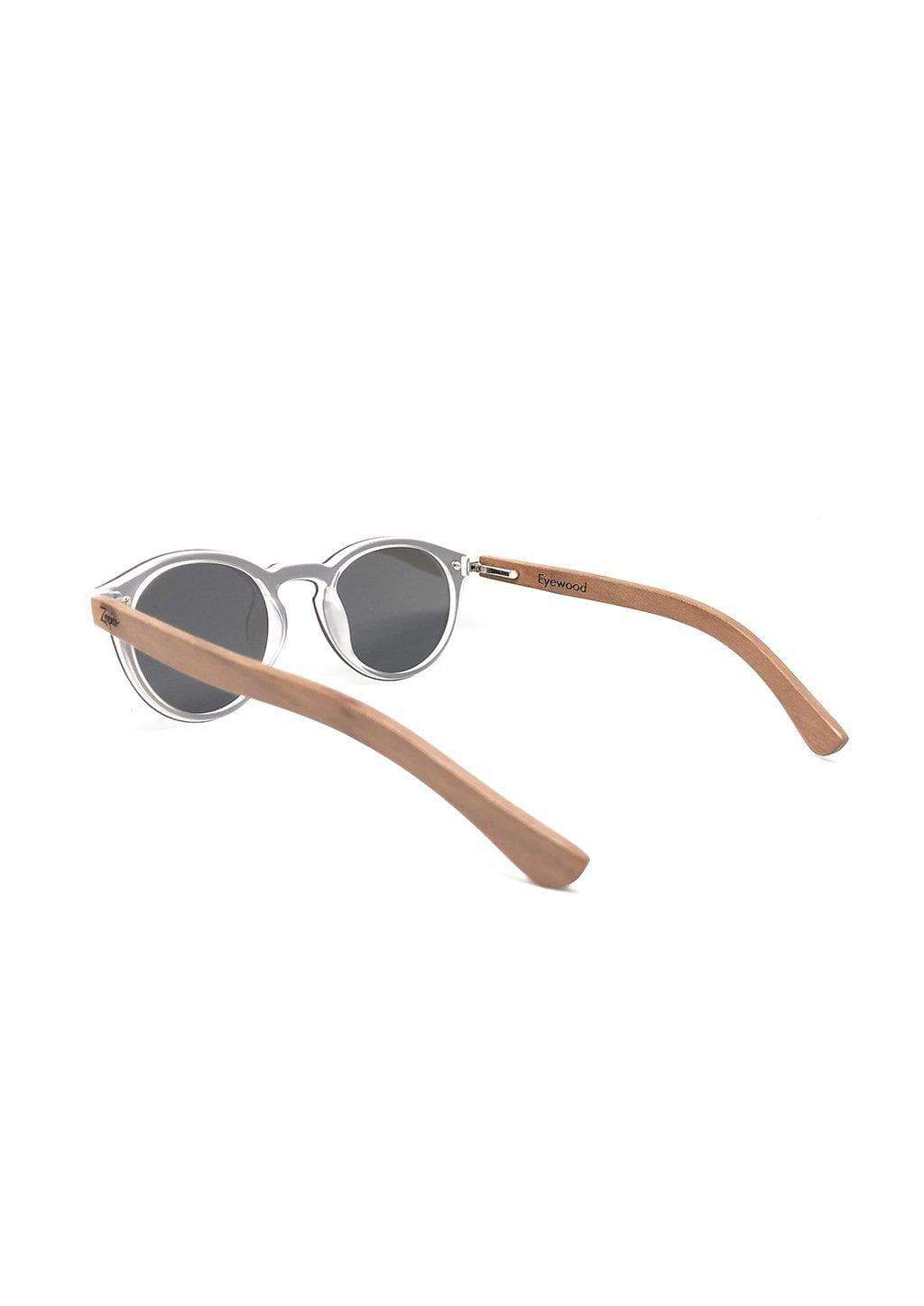 Lunettes de soleil monture blanche, verres foncés polarisés, branches bois