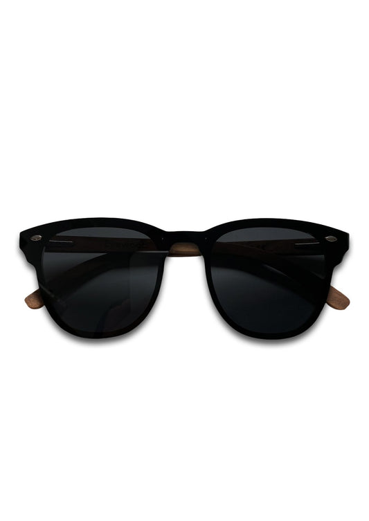 Lunettes de soleil noires à verres foncés, monture arrondie