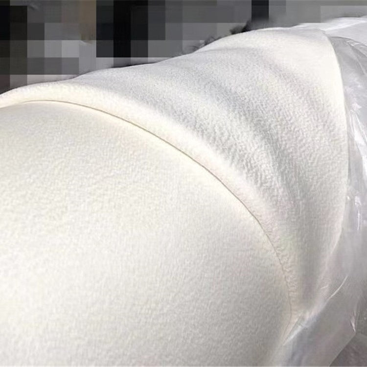 Tissu de manteau en laine blanc cassé, texture serrée et surface douce