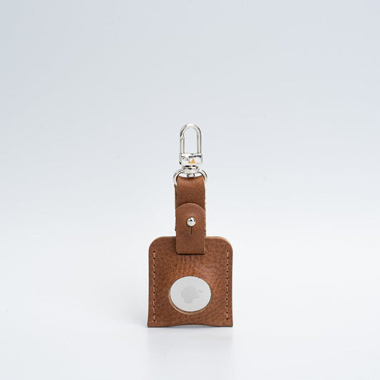Porte-clés en cuir brun avec mousqueton argenté et fenêtre ronde pour AirTag