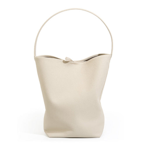 Sac seau en cuir Ideluxe™ blanc cassé, anses courbes, ouverture avec cordon, forme souple