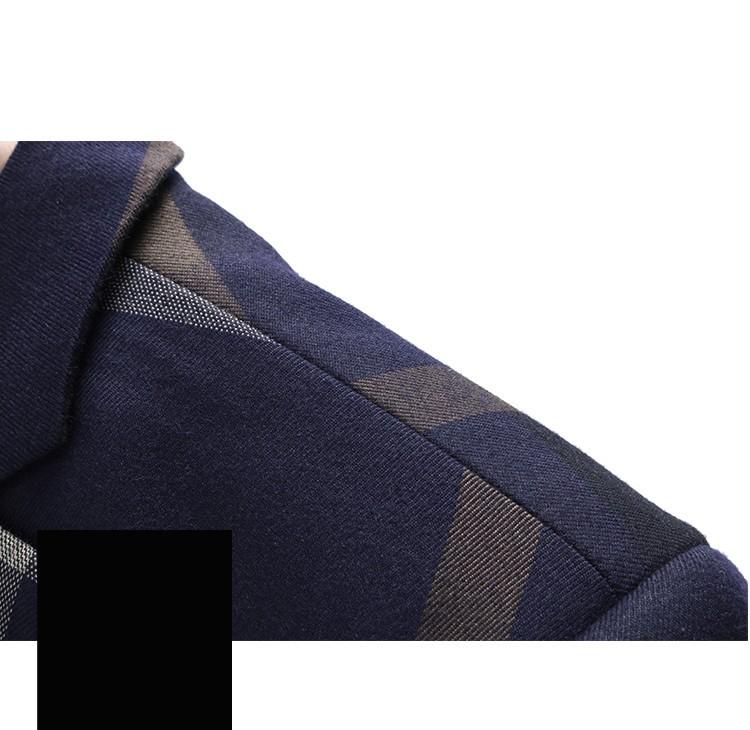 Détail tissu de costume bleu nuit à carreaux gris, texture texturée