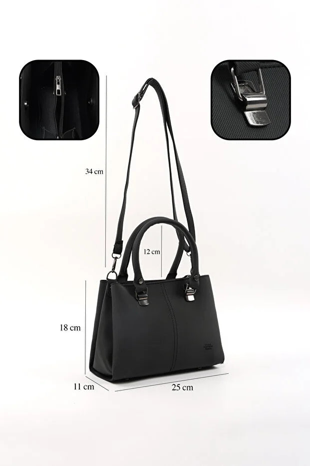 Sac noir à double poignée en cuir synthétique, dimensions visibles : 34 x 25 x 11 cm