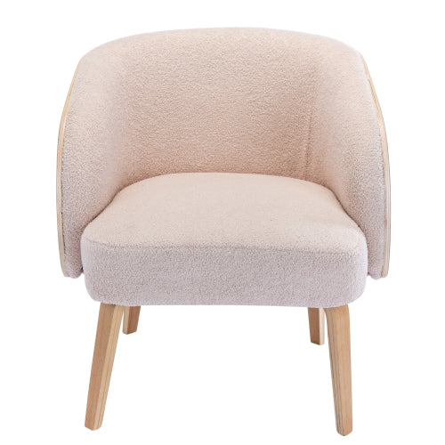 Fauteuil beige en laine d’agneau, assise et dossier arrondis, pieds en bois.