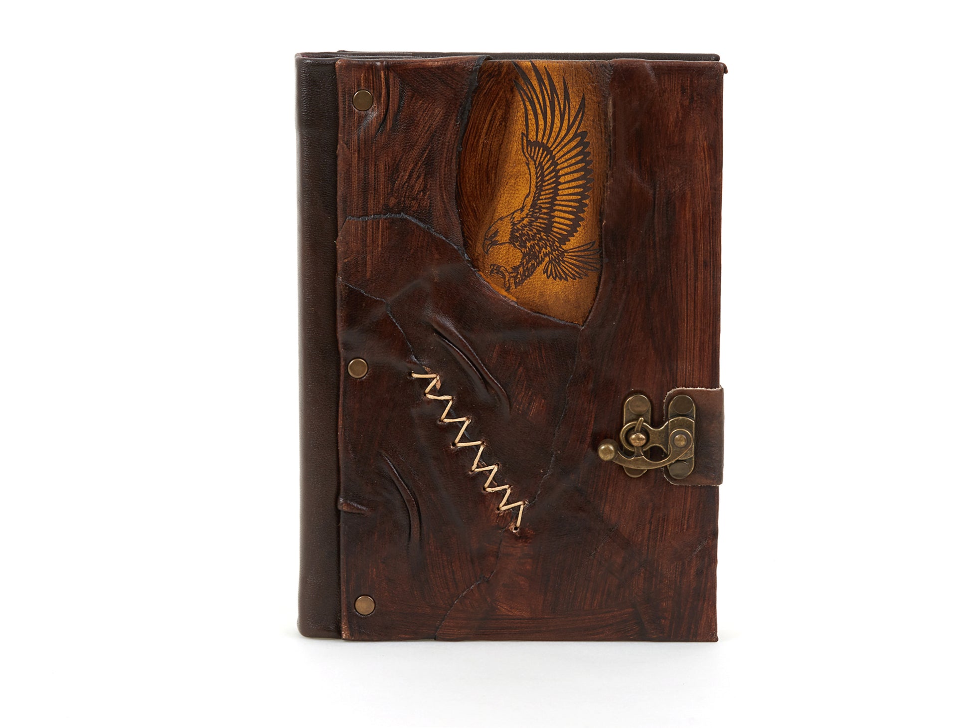 Carnet en cuir marron motif aigle doré, couture zigzag et attache bronze.